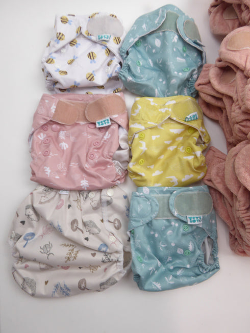 Tweedehands Startpakket 24 luiers - Newborn (2 – 7 kg) - Zo goed als nieuw!
